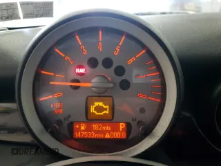 2009 MINI Hardtop with VIN WMWMF33569TW74610, listed as a Copart auction lot 54889805 with 147,533 mi miles and Salvage Title. Bid and sale history available at DreamBid. Image 9.