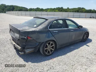 2004 Acura TSX w/Navigation with VIN JH4CL95984C027014, listed as a Copart auction lot 61915155 with 215,007 mi miles and Salvage title. Bid and sale history available at DreamBid. Image 3.