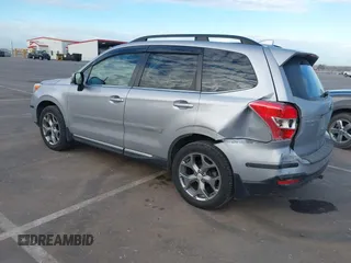 2016 Subaru Forester 2.5i Touring with VIN JF2SJAXC7GH455601, listed as a IAAI auction lot 41876613 with 133,976 mi miles. Bid and sale history available at carsss.com. Image 3.