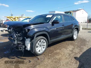 2023 Volkswagen Atlas SE z VIN 1V2HE2CA4PC209916, wystawiony jako IAAI lot #41957199 z przebiegiem 24 799 mil mil oraz . Historia ofert i sprzedaży dostępna na DreamBid. Obrazek 2.