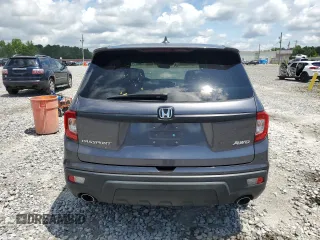 2021 Honda Passport EX-L with VIN 5FNYF8H54MB002017, listed as a Copart auction lot 59850975 with 54,275 mi miles and Salvage title. Bid and sale history available at DreamBid. Image 6.