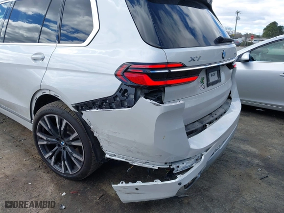 2023 BMW X7 xDrive40i with VIN 5UX23EM05P9R02428, listed as a IAAI auction lot 41695731 with 34,287 mi miles. Bid and sale history available at carsss.com. Image 6.