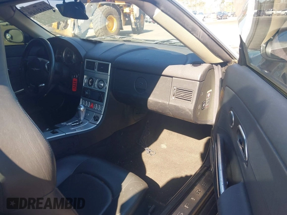 2005 Chrysler Crossfire Limited z VIN 1C3AN69L15X033940, wystawiony jako IAAI lot #41651049 z przebiegiem 88 450 mil mil oraz . Historia ofert i sprzedaży dostępna na DreamBid. Obrazek 5.
