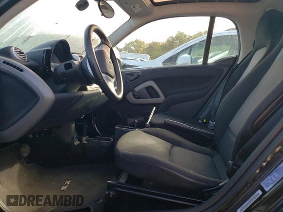 2013 Smart fortwo Passion z VIN WMEEJ9AA1DK717534, wystawiony jako Copart lot #73832094 z przebiegiem Nie podano mil oraz Tytuł czysty. Historia ofert i sprzedaży dostępna na DreamBid. Obrazek 7.
