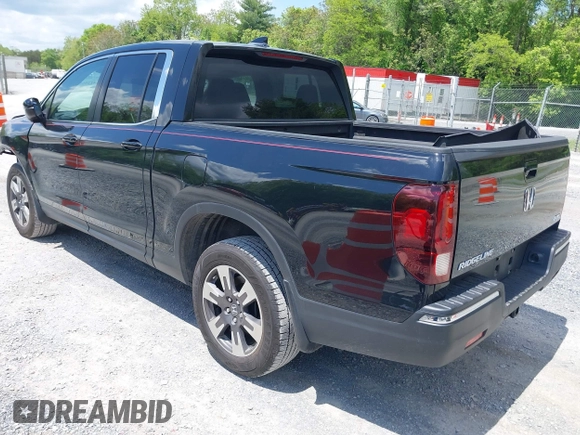2017 Honda Ridgeline RTL with VIN 5FPYK3F51HB013989, listed as a IAAI auction lot 42206513 with 146,124 mi miles and . Bid and sale history available at DreamBid. Image 3.