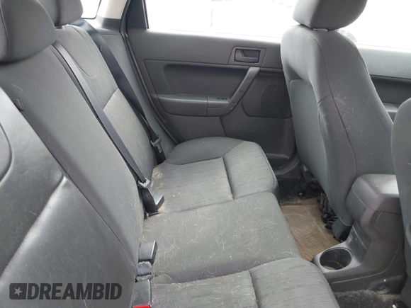 2009 Ford Focus SE with VIN 1FAHP35N49W178711, listed as a IAAI auction lot 42084721 with 203,889 mi miles. Bid and sale history available at carsss.com. Image 8.
