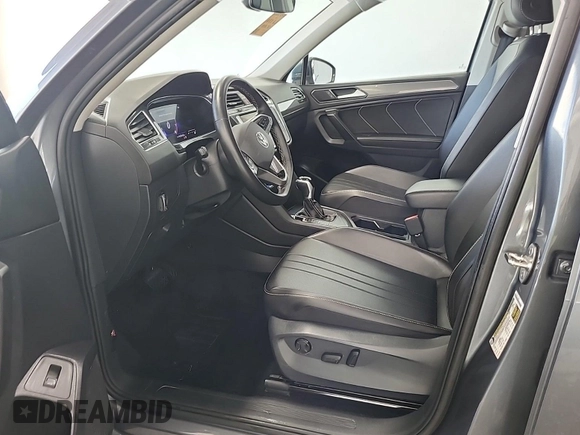2024 Volkswagen Tiguan SE with VIN 3VV3B7AX1RM108036, listed as a IAAI auction lot 42796415 with 37,805 mi miles and . Bid and sale history available at DreamBid. Image 9.