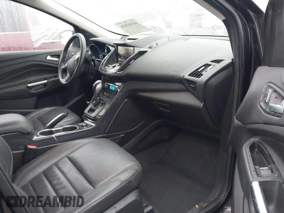 2015 Ford Escape Titanium with VIN 1FMCU0J97FUB45709, listed as a IAAI auction lot 41561636 with 88,296 mi miles. Bid and sale history available at carsss.com. Image 5.
