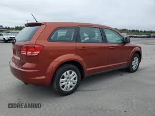 2014 Dodge Journey American Value with VIN 3C4PDCAB7ET102555, listed as a Copart auction lot 56461465 with 91,935 mi miles and Clean title. Bid and sale history available at DreamBid. Image 3.
