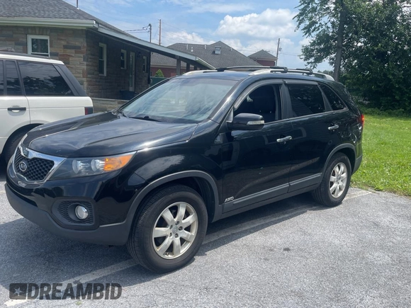 2013 Kia Sorento LX with VIN 5XYKTCA65DG324775, listed as a Copart auction lot 63433705 with 128,031 mi miles and Clean title. Bid and sale history available at DreamBid. Image 2.