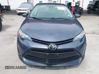 2018 Toyota Corolla L with VIN 5YFBURHE8JP770696, listed as a IAAI auction lot 42386025 with 63,224 mi miles and . Bid and sale history available at DreamBid. Image 12.