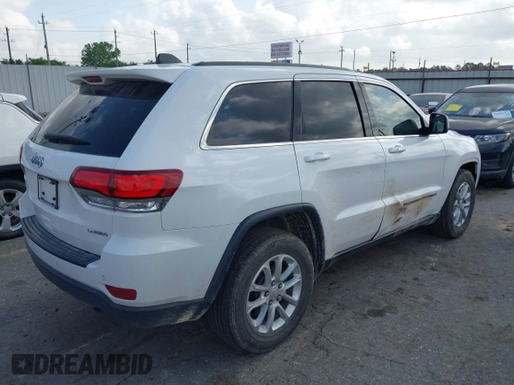 2022 Jeep Grand Cherokee Laredo X with VIN 1C4RJEAGXNC180641, listed as a IAAI auction lot 42074598 with 54,981 mi miles and . Bid and sale history available at DreamBid. Image 4.