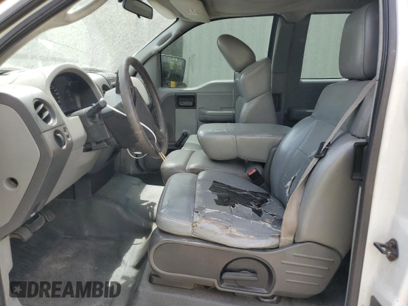 2005 Ford F-150 STX with VIN 1FTRX12W55NA33581, listed as a Copart auction lot 53717995 with 291,549 mi miles and Salvage title. Bid and sale history available at DreamBid. Image 7.