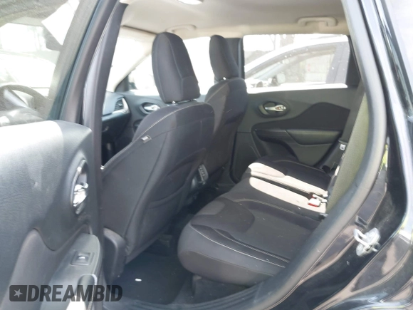 2015 Jeep Cherokee Latitude with VIN 1C4PJLCB9FW627909, listed as a IAAI auction lot 42034667 with 131,739 mi miles and . Bid and sale history available at carsss.com. Image 22.