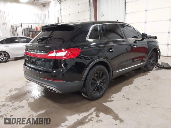 2016 Lincoln MKX Premiere with VIN 2LMTJ6JR4GBL75053, listed as a IAAI auction lot 41020450 with 120,930 mi miles. Bid and sale history available at carsss.com. Image 4.