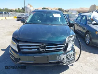 2018 Volkswagen Tiguan S with VIN 3VV1B7AX1JM165641, listed as a IAAI auction lot 42699622 with 75,354 mi miles and . Bid and sale history available at DreamBid. Image 11.