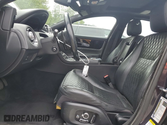 2016 Jaguar XJ Portfolio with VIN SAJWJ2GDXG8V93228, listed as a Copart auction lot 62832115 with 45,536 mi miles and Salvage title. Bid and sale history available at DreamBid. Image 7.