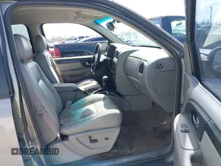 2006 GMC Envoy SLT with VIN 1GKDS13S462185122, listed as a IAAI auction lot 41778816 with 220,974 mi miles. Bid and sale history available at carsss.com. Image 5.