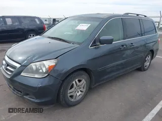2005 Honda Odyssey EX with VIN 5FNRL38465B108123, listed as a IAAI auction lot 41961270 with 169,948 mi miles. Bid and sale history available at carsss.com. Image 6.