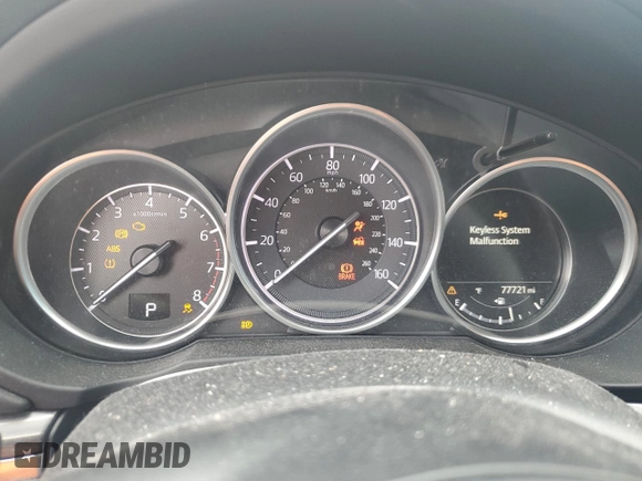2018 Mazda CX-5 Grand Touring с VIN JM3KFBDM8J0424633, выставлен на аукционе Copart как лот 59888035 с пробегом 77 721 миль миль и Списание • Salvage title. История ставок и продаж доступна на DreamBid. Изображение 9.