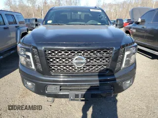 2018 Nissan Titan XD Platinum Reserve with VIN 1N6BA1F4XJN516387, listed as a Copart auction lot 88000895 with 77,492 mi miles and Clean Title. Bid and sale history available at carsss.com. Image 5.