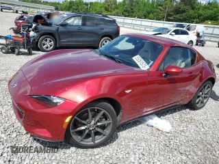 2020 Mazda MX-5 Miata Grand Touring z VIN JM1NDAM70L0414102, wystawiony jako Copart lot #55261575 z przebiegiem 70 157 mil mil oraz Szkoda całkowita • Salvage title. Historia ofert i sprzedaży dostępna na DreamBid. Obrazek 1.