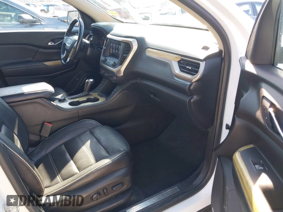 2019 GMC Acadia Denali with VIN 1GKKNPLS2KZ166670, listed as a IAAI auction lot 41673866 with 79,723 mi miles and . Bid and sale history available at carsss.com. Image 5.