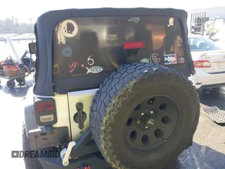 2011 Jeep Wrangler Rubicon with VIN 1J4BA6D10BL514776, listed as a IAAI auction lot 41487396 with 172,208 mi miles. Bid and sale history available at carsss.com. Image 17.