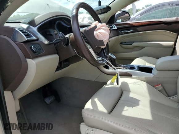 2015 Cadillac SRX Premium Collection with VIN 3GYFNDE30FS568976, listed as a Copart auction lot 57725515 with 67,622 mi miles and Salvage title. Bid and sale history available at DreamBid. Image 7.