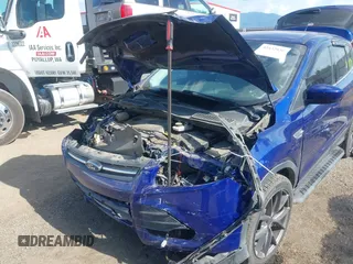 2013 Ford Escape SE with VIN 1FMCU9GXXDUB70983, listed as a IAAI auction lot 42432050 with 97,515 mi miles and . Bid and sale history available at DreamBid. Image 6.