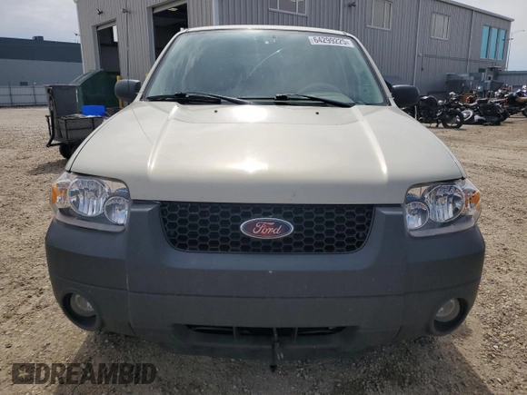 2005 Ford Escape XLT with VIN 1FMYU03165KC03784, listed as a Copart auction lot 64299225 with 185,033 mi miles and Salvage title. Bid and sale history available at DreamBid. Image 5.