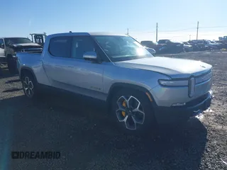 2023 Rivian R1T Adventure with VIN 7FCTGAAA0PN021864, listed as a IAAI auction lot 41620630 with 1 mi miles. Bid and sale history available at carsss.com. Image 1.
