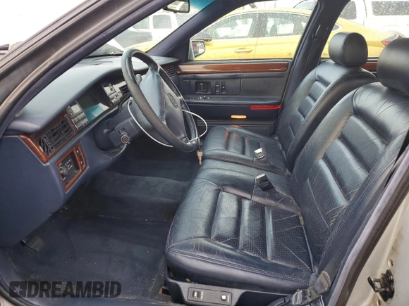 1994 Cadillac Concours z VIN 1G6KF52Y3RU231877, wystawiony jako Copart lot #82150174 z przebiegiem 76 279 mil mil oraz Szkody całkowita. Historia ofert i sprzedaży dostępna na DreamBid. Obrazek 7.