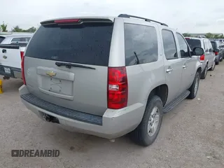 2007 Chevrolet Tahoe LS with VIN 1GNFC13C57R417897, listed as a IAAI auction lot 42588952 with 212,919 mi miles and . Bid and sale history available at DreamBid. Image 4.