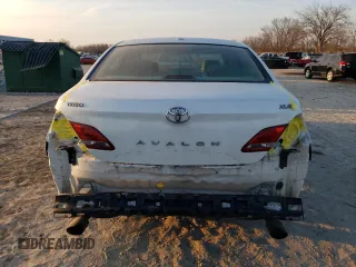 2009 Toyota Avalon XL with VIN 4T1BK36B19U339669, listed as a Copart auction lot 48547195 with 243,217 mi miles and Salvage Title. Bid and sale history available at carsss.com. Image 6.