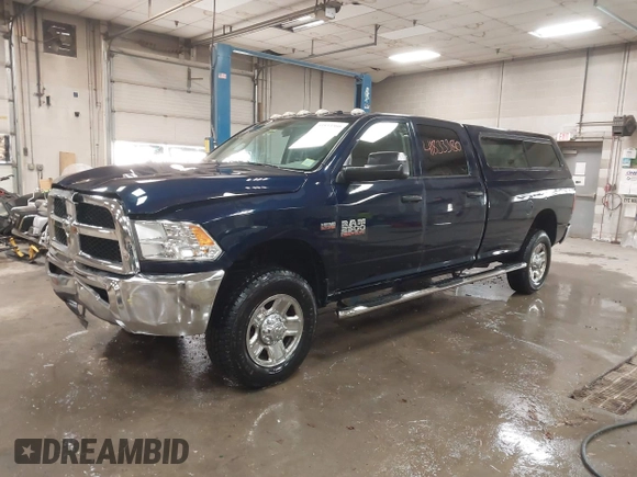 2015 Ram 2500 Tradesman z VIN 3C6TR5HTXFG605539, wystawiony jako IAAI lot #41833380 z przebiegiem 103 921 mil mil oraz . Historia ofert i sprzedaży dostępna na DreamBid. Obrazek 2.