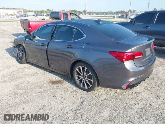 2019 Acura TLX with VIN 19UUB2F39KA004586, listed as a IAAI auction lot 41971144 with 61,081 mi miles and . Bid and sale history available at DreamBid. Image 3.