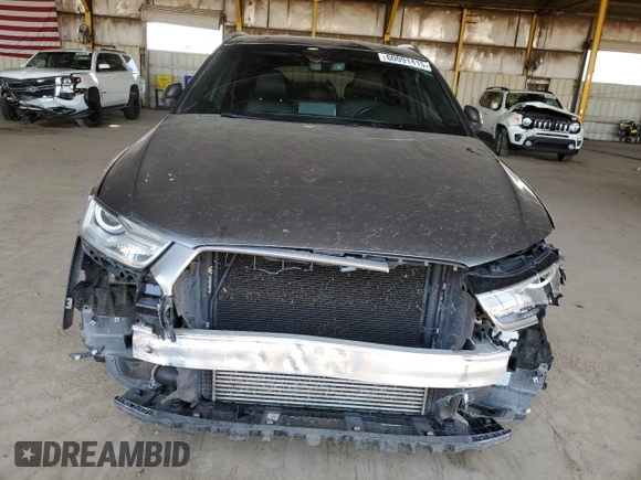 2018 Audi Q3 Premium with VIN WA1ECCFS8JR021306, listed as a Copart auction lot 60091415 with 100,604 mi miles and Salvage title. Bid and sale history available at DreamBid. Image 5.
