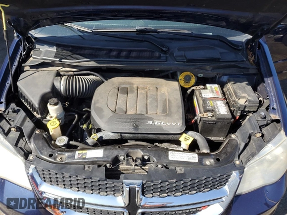 2014 Dodge Grand Caravan American Value with VIN 2C4RDGBG5ER260339, listed as a Copart auction lot 54533055 with 188,952 mi miles and Clean Title. Bid and sale history available at DreamBid. Image 12.