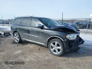 2013 Dodge Durango Citadel with VIN 1C4SDJET1DC505202, listed as a IAAI auction lot 41613403 with 148,424 mi miles and . Bid and sale history available at carsss.com. Image 1.