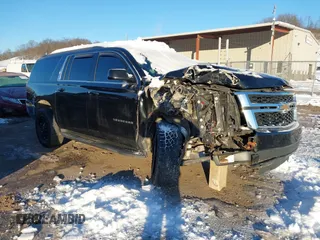 2020 Chevrolet Suburban LT with VIN 1GNSKHKC5LR304201, listed as a IAAI auction lot 41223845 with 115,270 mi miles. Bid and sale history available at carsss.com. Image 1.