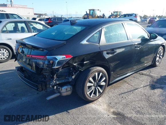 2023 Honda Civic Sedan EX with VIN 2HGFE1F75PH324493, listed as a IAAI auction lot 41692213 with 14,026 mi miles. Bid and sale history available at carsss.com. Image 4.