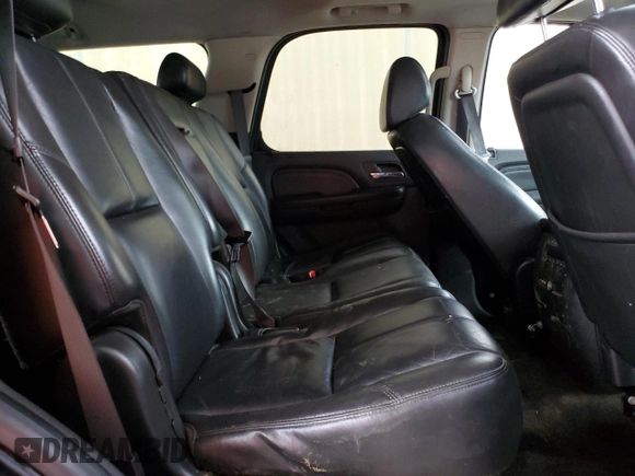 2009 GMC Yukon Denali z VIN 1GKFK03229J124008, wystawiony jako Copart lot #56189155 z przebiegiem 258 994 mil mil oraz Tytuł czysty. Historia ofert i sprzedaży dostępna na DreamBid. Obrazek 11.