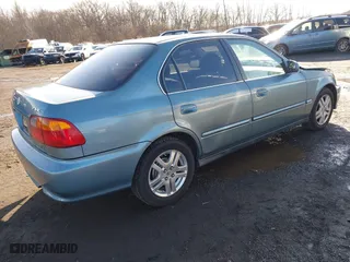 2000 Honda Civic EX with VIN 1HGEJ8649YL047194, listed as a IAAI auction lot 41526765 with 127,697 mi miles. Bid and sale history available at carsss.com. Image 4.