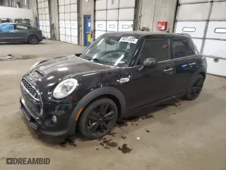 2016 MINI Cooper Hardtop 4 Door S with VIN WMWXU3C5XG2B63166, listed as a Copart auction lot 84016934 with 58,921 mi miles and Salvage Title. Bid and sale history available at carsss.com. Image 1.