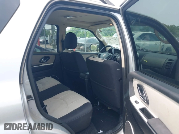 2005 Mercury Mariner Luxury z VIN 4M2CU57135DJ23718, wystawiony jako IAAI lot #42441869 z przebiegiem 179 378 mil mil oraz . Historia ofert i sprzedaży dostępna na DreamBid. Obrazek 8.
