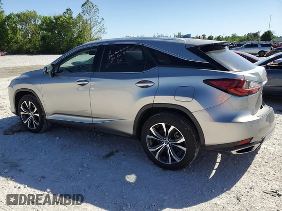 2021 Lexus RX 350 with VIN 2T2HZMDA0MC260229, listed as a Copart auction lot 57242465 with 51,051 mi miles and Salvage title. Bid and sale history available at DreamBid. Image 2.