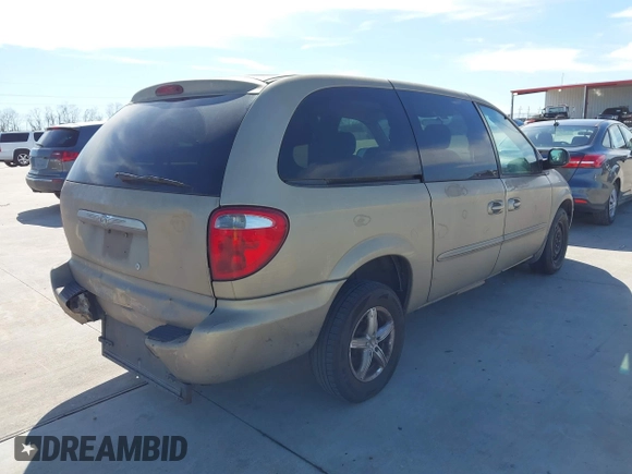 2003 Chrysler Town & Country LX with VIN 2C4GP44L73R103612, listed as a IAAI auction lot 41680848 with 211,360 mi miles and . Bid and sale history available at DreamBid. Image 4.