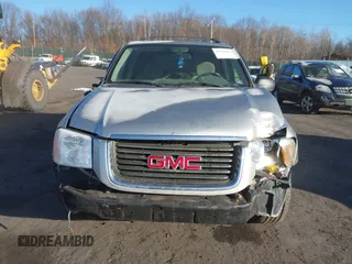 2005 GMC Envoy SLE with VIN 1GKDT13S452194933, listed as a IAAI auction lot 41426512 with 176,897 mi miles. Bid and sale history available at carsss.com. Image 12.