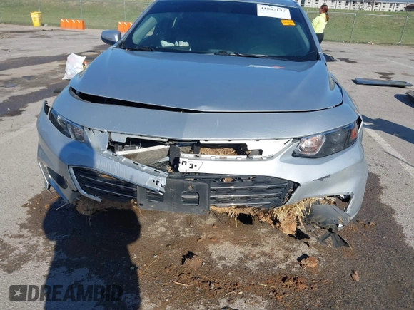 2018 Chevrolet Malibu LT z VIN 1G1ZD5ST1JF261841, wystawiony jako IAAI lot #41887177 z przebiegiem 128 213 mil mil oraz . Historia ofert i sprzedaży dostępna na DreamBid. Obrazek 6.
